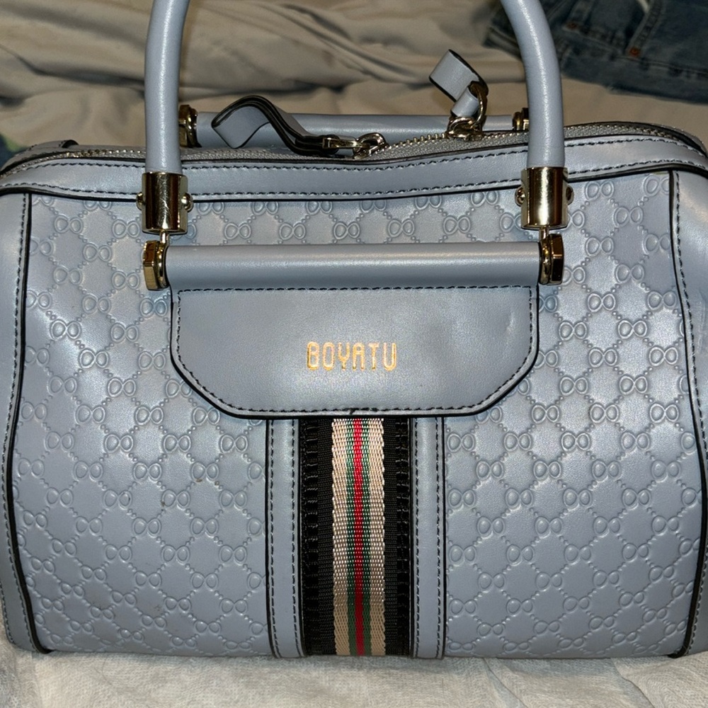 Ladies gray/blue bag with dust cover